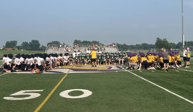 Mendota, St. Bede and Sandwich football players meet before a joint practice on Thursday, July 31, 2025 at Mendota High School.