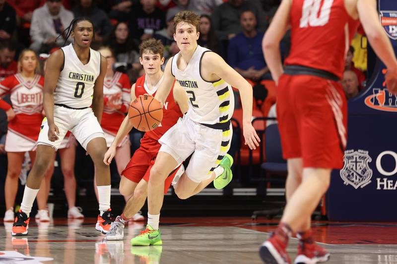 Yorkville Christian’s Jaden Schutt takes the ball up court against Liberty in the Class 1A championship game at State Farm Center in Champaign. Saturday, Mar. 12, 2022, in Champaign.