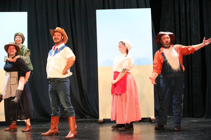 The cast of the " The Trail to Oregon!" (from left) Chloe Clayton, Allesyn Wilke, Dan Schweizer, Kylie Atkins and Bob Philip act out a scene during a rehearsal on Wednesday, Sept. 5, 2024, at Stage 212 in La Salle. The production is based off of the classic video game "Oregon Trail."  It does have frequent coarse language, loud gunshot sound effects and depictions of violence and discussions of intimacy. "The Trail to Oregon!" is presented Sept. 20-22. Friday and Saturday performances begin at 7:30 p.m. The Sunday matinee begins at 2 p.m. Tickets are $22 each, and may be purchased by visiting the box office Monday 4-6 p.m. and Saturday 9 a.m. - noon or by calling 815-224-3025 during those hours. Tickets may also be purchased online by visiting stage212.org.