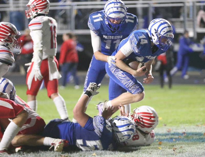 Princeton quarterback William Lott scores a touchdown over Oregon during the Class 3A playoff game on Friday, Nov. 1, 2024 at Princeton High School.