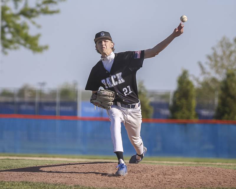 Oswego East's Austin Aguilera (21) throws a pitch during baseball game Oswego East at Oswego.  May 14, 2026 in Oswego.