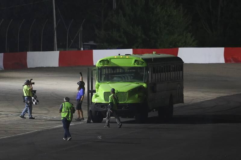 Sean Matthuis celebrates his school bus heat race win on a special fundraising night for the Special Olympics at Grundy County Speedway on June 15, 2024 in Morris.