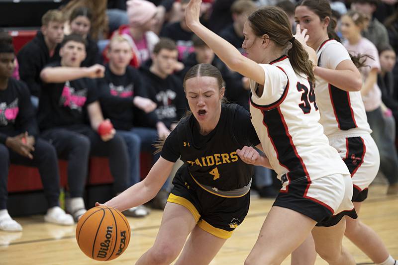 AFC’s Reese Polk drives against Amboy’s Bella Yanos Tuesday, Jan. 27, 2026.