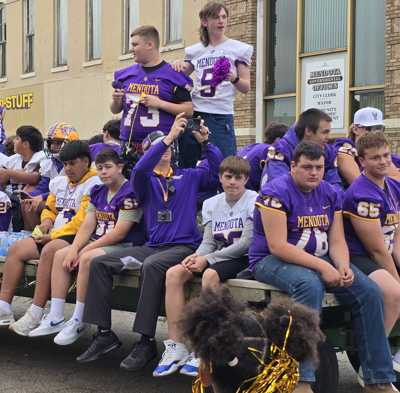 The Mendota High School football team rides in the homecoming parade Friday, Sept. 27, 2024.