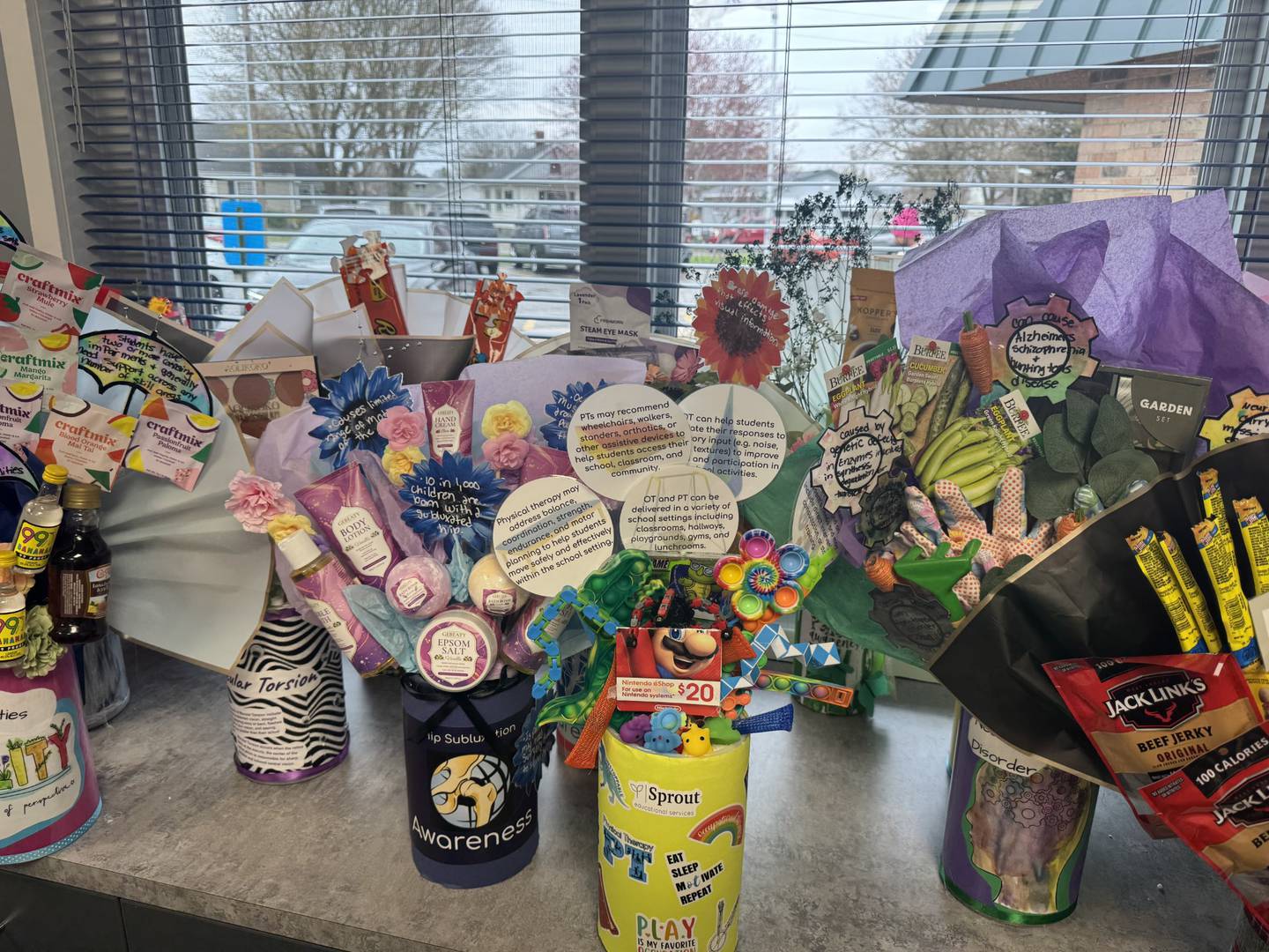 Each of these 30 raffle baskets represents a syndrome or a disability that a student of Lighted Way has been diagnosed with. They were created as a way to further educated the community.