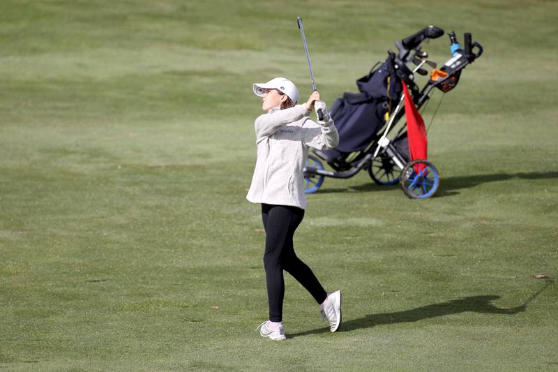 South Elgin’s Autumn Burnett hits from the fairway during the Class 2A South Elgin Regional at the Highlands of Elgin on Thursday, Sept. 29, 2022.