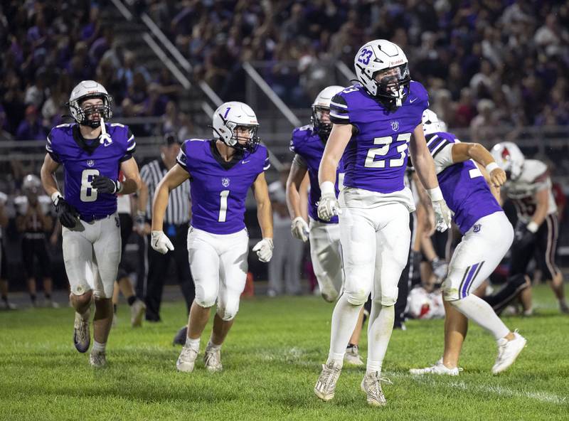 The Dixon defense celebrate a turnover against Stillman Valley Friday, Oct. 3, 2025.