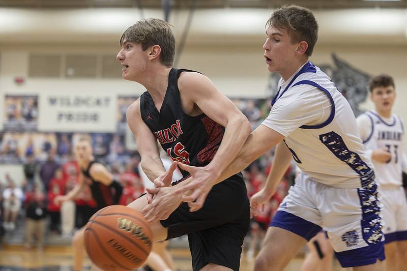 Fulton’s Landen Leu has the ball stripped away by against Pecatonica’a Drew Williams during a class 1A sectional semifinal Wednesday, Feb. 28, 2024 at River Ridge High School.