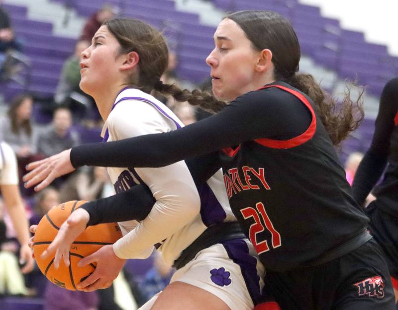 Hampshire’s Veronica Dumoulin, left, works past  Huntley’s Luca Garlin in varsity girls basketball on Wednesday, Feb. 11, 2026, at Hampshire High School in Hampshire.