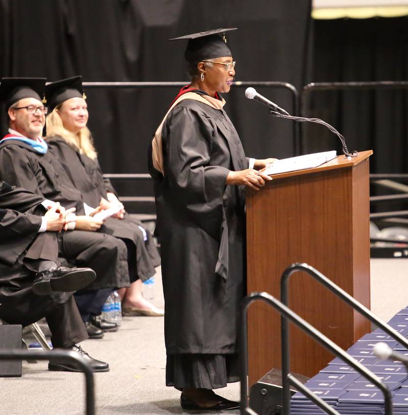 Mrs. LaTonya Simelton, President of District 308 Board of Education starts the presentation of the diplomas at the Graduation Ceremony for Oswego East High School on May 21, 2022.