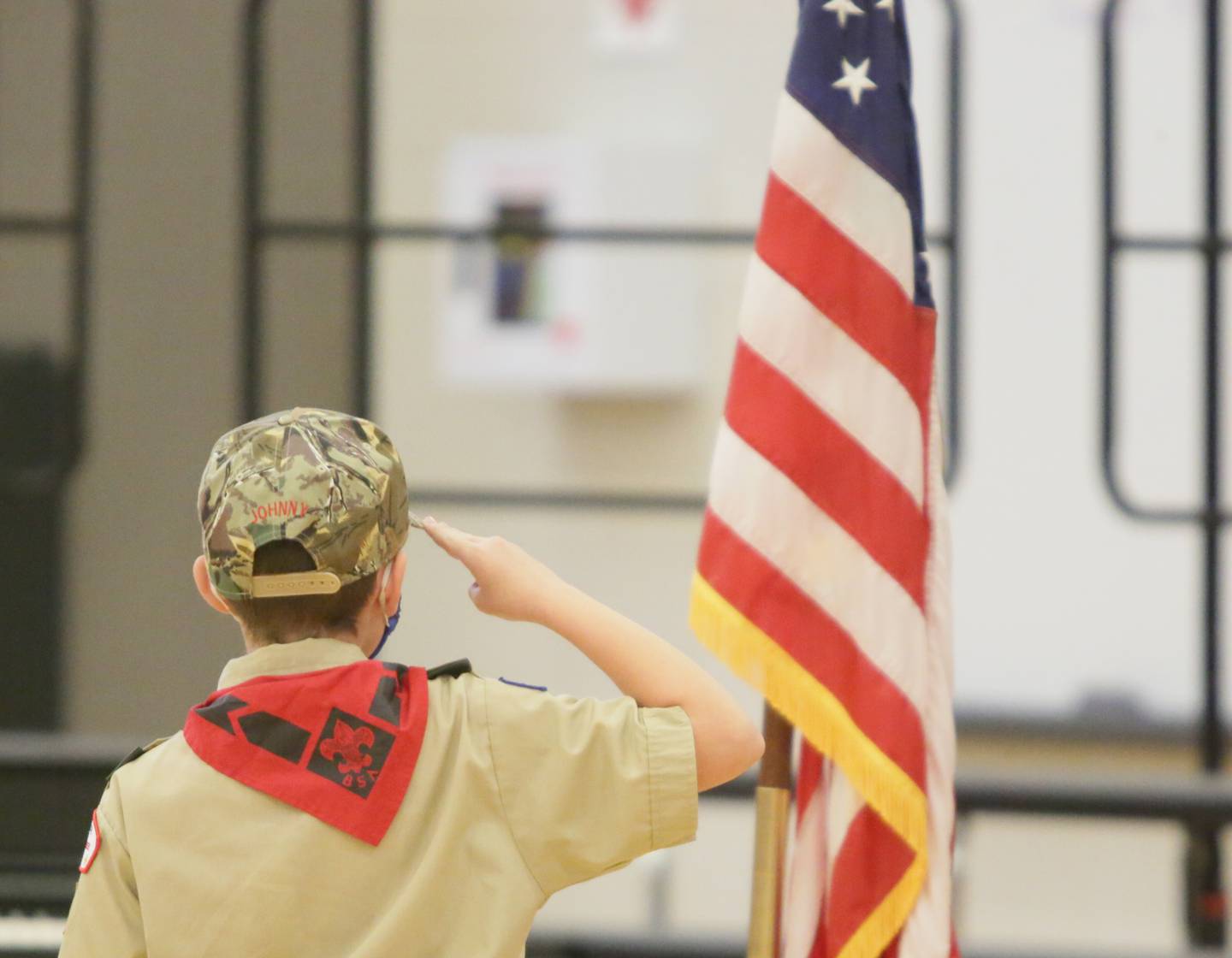 Boy Scout John Michael, and student salutes the flag during a Veterans Day program on Thursday Nov. 11 at Parkside School in Peru. The program featured the presentation of the flags by the local Boy Scouts; the Peru Parkside Concert Choir; the Peru Parkside combined fifth and sixth grade choirs; the Peru Parkside Concert Band; the eighth grade Veterans Day readers; and Taps.