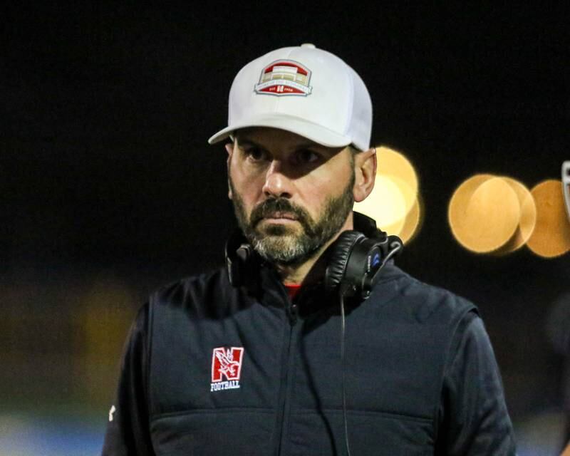 Naperville Central's head coach Mike Ulreich roams the sidelines during Class 8A quarterfinal football game between Naperville Central at Lyons on Friday, Nov 15, 2024  in Western Springs.