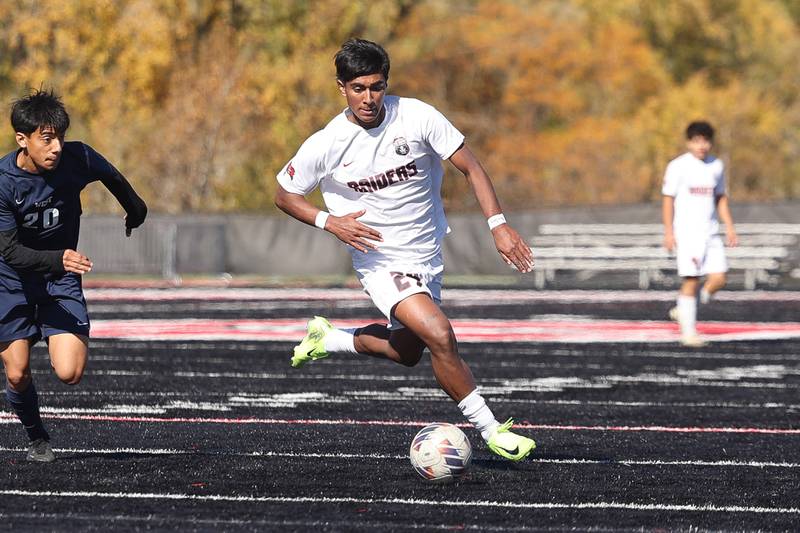 Bolingbrook’s Iggie Escamilla works the ball against West Aurora in the Class 3A Bolingbrook Regional championship match on Saturday, Oct. 26, 2024 in Bolingbrook.