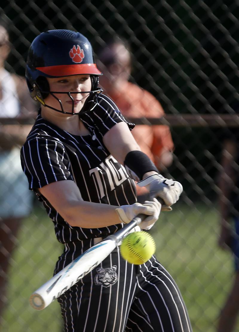 Crystal Lake Central's Makayla Malone connects with the ball during a Fox Valley Conference softball game against Crystal Lake Central on Wednesday, May 14, 2025, at Crystal Lake Central High School.