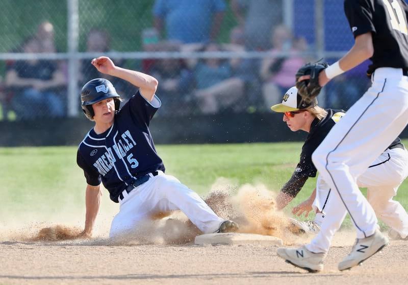 Bureau Valley's Carter Salisbury slides into second base in Thursday's 5-4 regional semifinal win over Riverdale Thursday.