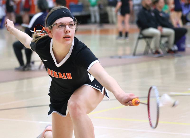 DeKalb junior Carly Kammes stretches for a shot during her match against Dana Bogda, a senior from Lincoln-Way West Friday, May 10, 2024, during the IHSA State Badminton Finals at DeKalb High School. Kammes was able to advance after defeating Bogda.