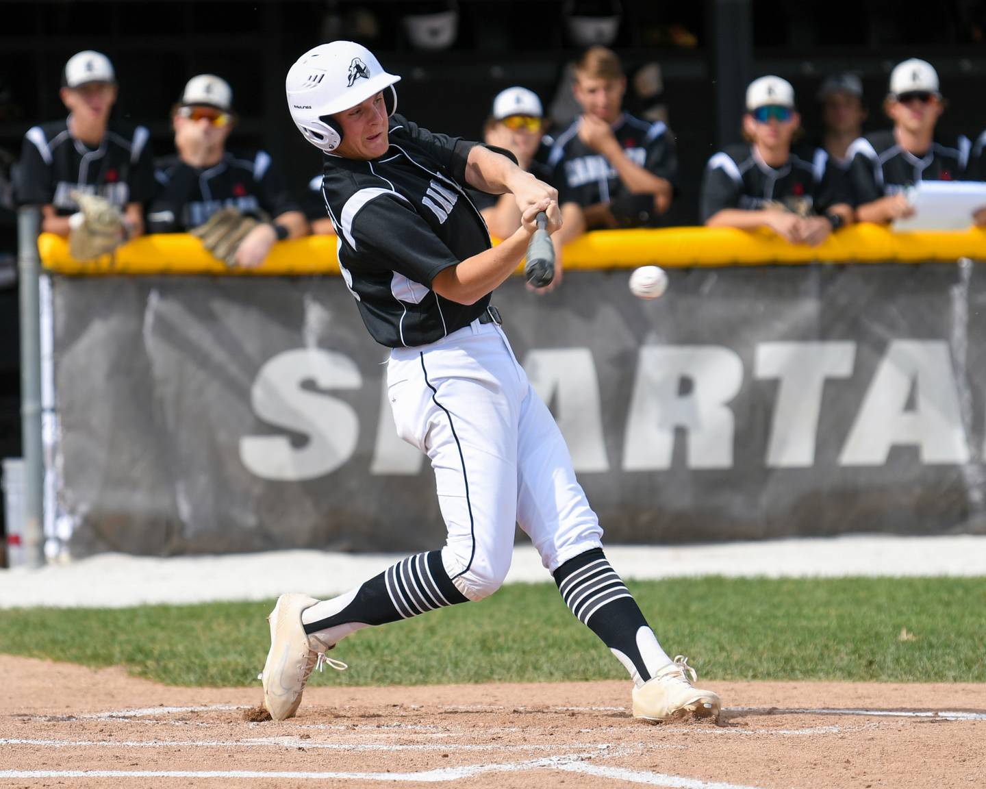 Kaneland Johnny Spallasso (24) makes contact with the ball to score some runs early in the game on Wednesday June 1st while taking on Dixon High School during a sectional play off game held in Sycamore.