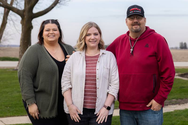 Kelsey Krumme, center, an elementary school librarian at Emerson Elementary in Wheaton, will donate a kidney to Joe Howard, right. Joe Howard is the father of Alexis Howard, left, Krumme's best friend.