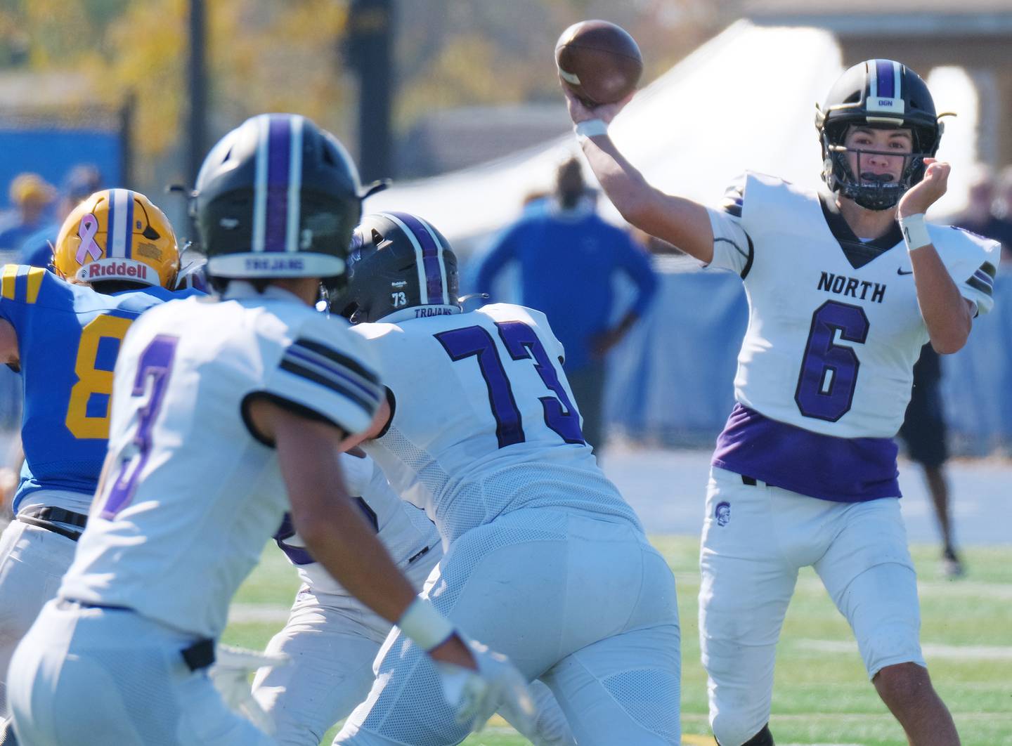 Downers Grove North quarterback Sam Reichert (6) fires a pass to Ethan Thulin (3) during a game on Oct. 22, 2022 at Lyons Township High School in LaGrange.