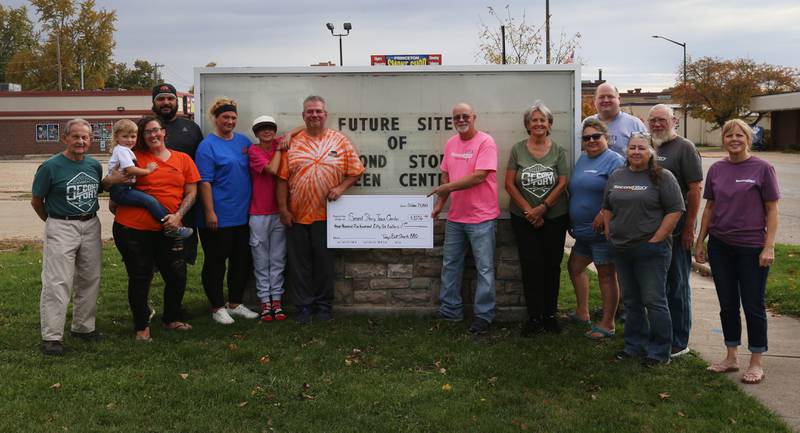 Tony's Butt Shack BBQ and Catering recently donated $3,556 to Second Story Teen Center on Tuesday, Oct. 24, 2023 at the centers future home located at 124 S. Main Street in Princeton. Money was raised during Homestead weekend and served customers during the festival. Tony Vaccaro, owner of Tony's Butt Shack (center) presented the check to Second Story Teen Center founders Jeff and Dana VanAutreve. Tony's Butt Shack is located on U.S. Route 6 in Hollowayville.