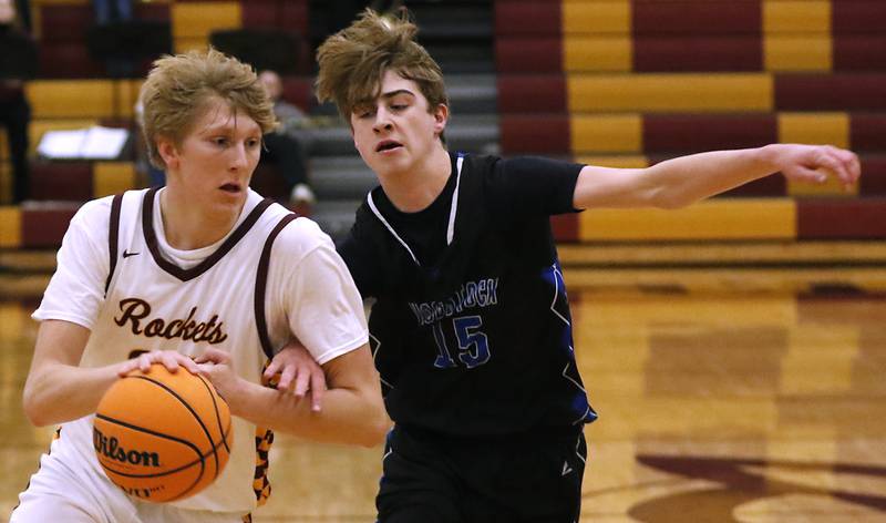 Richmond-Burton's Luke Robinson push the ball up the court against Woodstock's Liam Laidig during a Kishwaukee River Conference basketball game on Wednesday, Feb. 5, 2025, at Richmond-Burton High School.