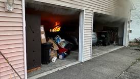 Firefighters stop garage fire from spreading to home in Lake in the Hills