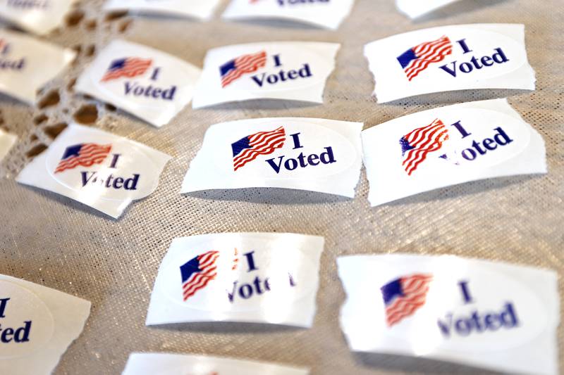 "I Voted" stickers sit on a table at the Holloway Center in Dixon on Tuesday, April 1, 2025.