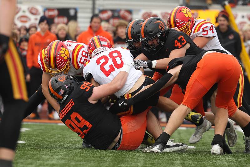 Lincoln-Way West’s Olin King brings down Batavia’s Nathan Whitewall for a loss on Saturday, Nov. 9, 2024 in New Lenox.