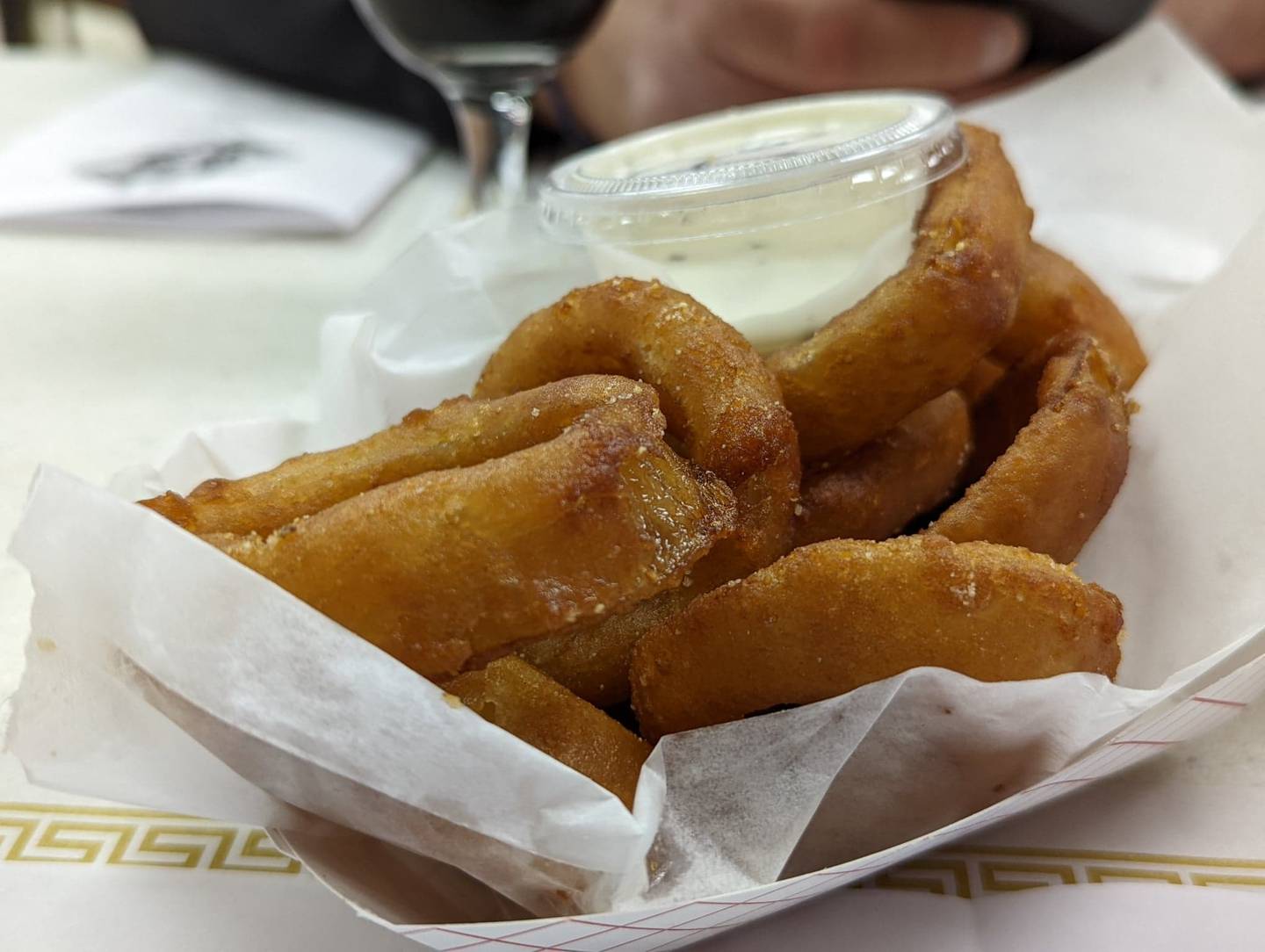 The Knights of Columbus Holy Trinity Council No. 4400 on Joliet's East side offer a choice of four different appetizers at its fish fries, all for $7.95 each: mozzarella sticks with marinara sauce, onion Rings, fried mushrooms and macaroni and cheese bites. Pictured are the onion rings.