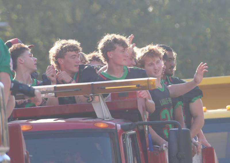 The L-P football team rides during the L-P homecoming parade on Thursday, Oct. 2, 2025 downtown Peru.