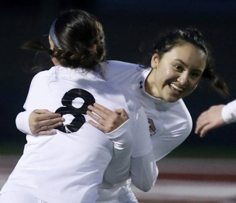McHenry’s Jasmine Ortiz (right) celebrates her goal with teammate, Elena Carlos, during a non-conference girls soccer match Thursday, March 16, 2023, at Richmond-Burton High.