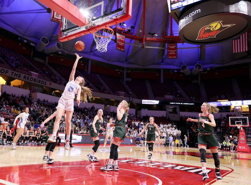 Nazareth Academy's Mary Bridget Wilson (15) drives to the hoop during the IHSA Class 3A girls basketball championship game at the CEFCU Arena on the campus of Illinois State University Saturday March 4, 2023 in Normal.