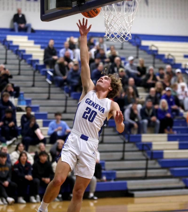 Geneva’s Jack Hatton gputs the ball up during a game against South Elgin on Monday, Nov. 25, 2024 in Geneva.