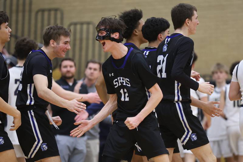 St. Francis’ Tanner Hozian celebrates a win over Lemont in the Class 3A Hinsdale South Regional semifinal game on Tuesday, March 3, 2026 in Darien.