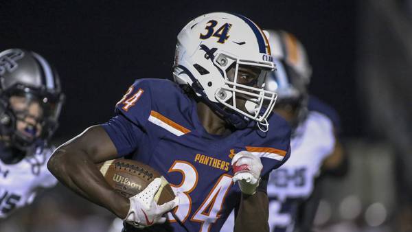‘I had to ball out for her’: Oswego RB shines as mom sees him play high school football for first time
