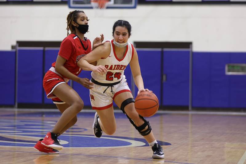 Bolingbrook’s Yahaira Bueno makes a move against Eisenhower in the Class 4A Lincoln-Way East Regional semifinal. Monday, Feb. 14, 2022, in Frankfort.