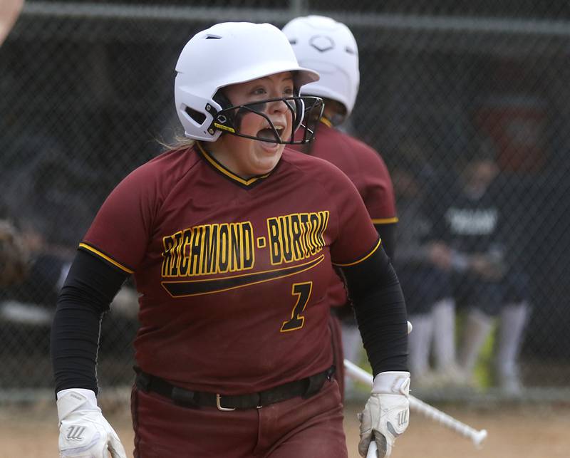 Richmond-Burton’s Lyndsay Regnier yells at her teammates as they rally to tie the score during a non-conference softball game against Cary-Grove Tuesday, March 21, 2023, at Cary-Grove High School.