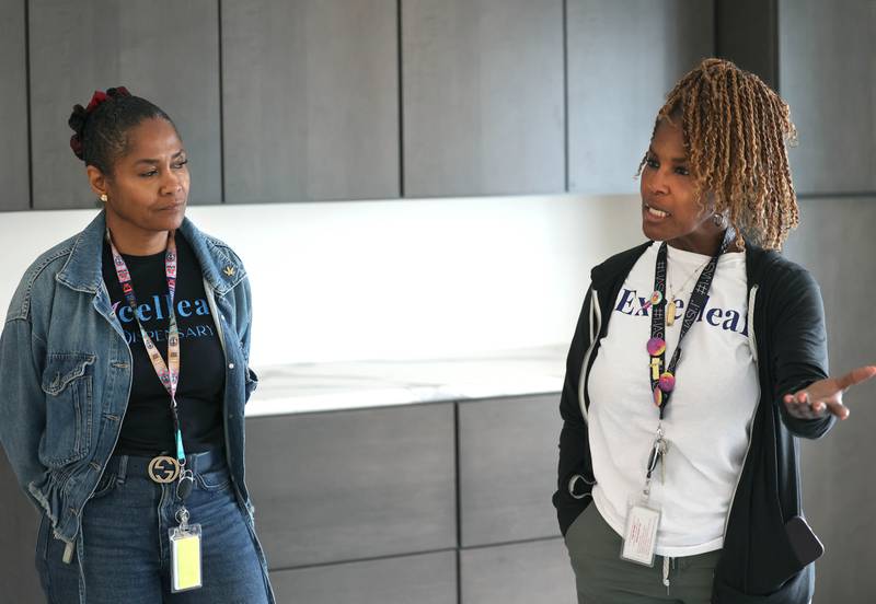 Two of Excelleaf’s owners Crystal Anderson, (left) and Maria Davis talk Friday, June 20, 2025, from what will be the new tasting room at the marijuana dispensary in DeKalb. Tastings would include edible cannabis products only, instead of products to smoke or inhale.