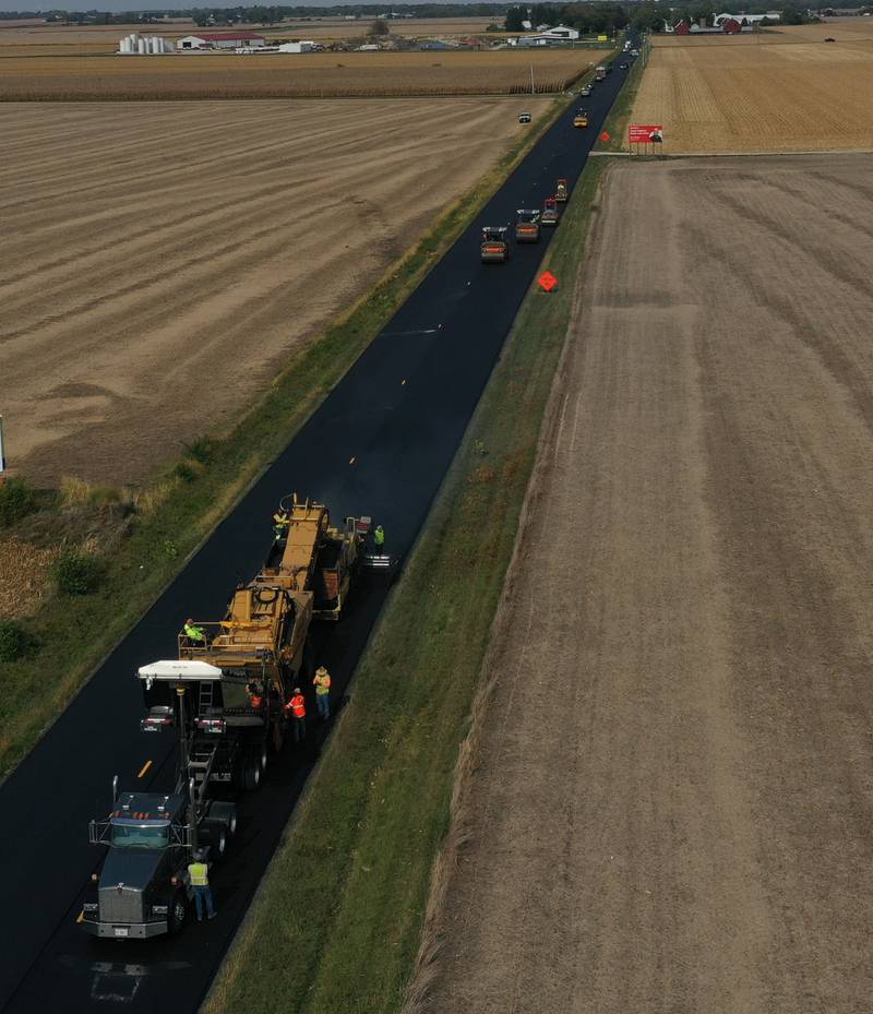 Crews resurface Illinois Route 251 on Friday, Oct. 17, 2025 near the intersection of North 39th Road just south of Mendota. Resurfacing work consists of patching and resurfacing, which is expected to be completed in mid-November. The work zone stretches from the BNSF railroad bridge south of Mendota to just north of Interstate 80 in Peru. The construction will continue into the spring with earth work. Motorists are asked to drive with caution through the construction zone. The Route 251 work between Mendota and Peru will lead to daily lane closures controlled by flaggers.
