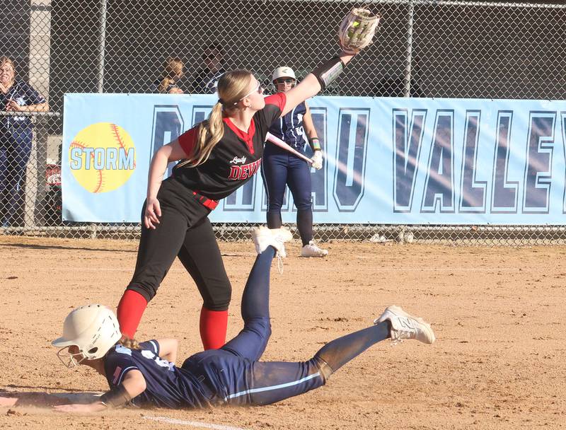 Hall's Ava Delphi makes a catch at first base as Bureau Valley's Ali Carrington gets back to the bag on Monday, March 9, 2026 at Bureau Valley High School.