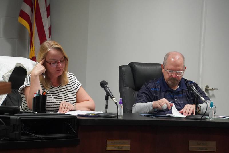 Hillcrest Village Trustees Eileen Braski (left) and Tim Ball (right) participate in a meeting on Wednesday, Nov. 12, 2025.