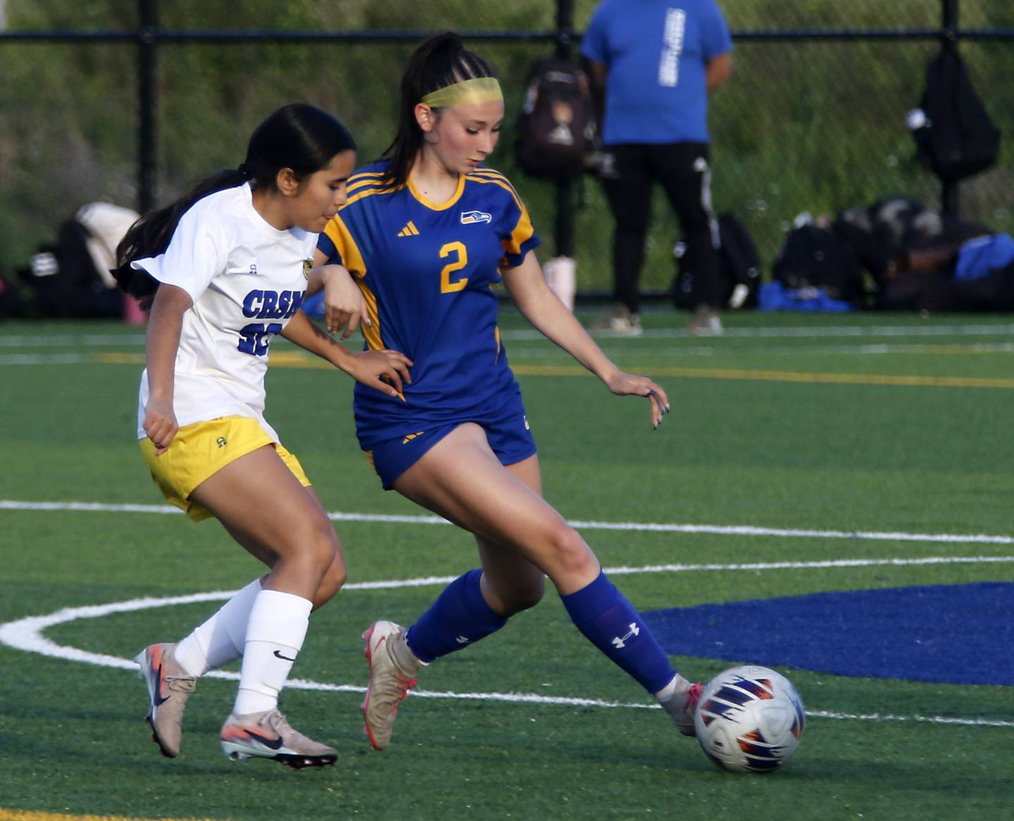 Willows Academy's Mary Seuffert takes a shot at goal in front of Richmond-Burton's Sydney Frericks during an IHSA Class 1A Cristo Rey St. Martin Sectional semifinal girls soccer match on Tuesday, May 26, 2026 at Cristo Rey St. Martin College Prep, in Waukegan.