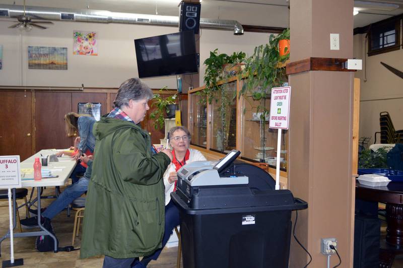 Sue Heyer, of Polo, (left) waits for confirmation that her ballot has been accepted Tuesday Nov. 5, 2024, at the Polo Area Senior Center.