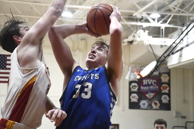 Clifton Central's Jake Thompson goes up for a shot over St. Anne's Jackson Hawkins during St. Anne's 61-56 victory over Clifton Central on Tuesday January 6, 2026.