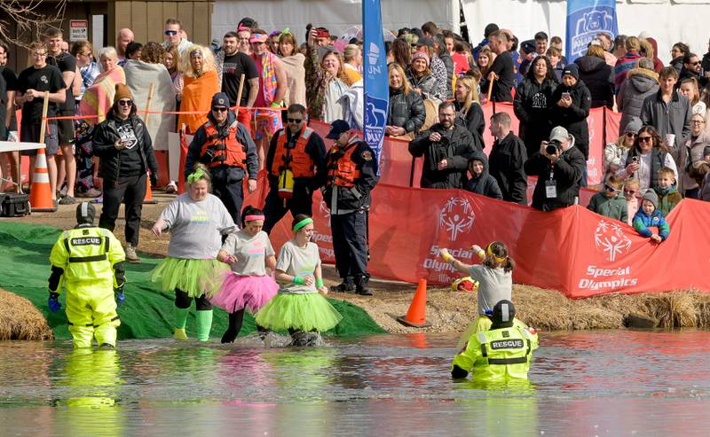 A group calling themselves the “Arctic Educators”  take part in Law Enforcement Torch Run Polar Plunge for Special Olympics Illinois athletes at Silver Springs State Park emerges from a full plunge on Sunday, Mar 1, 2026 in Yorkville.