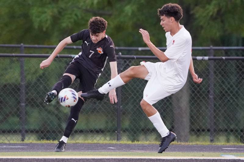 Wheaton Warrenville South's Logan LaFratta (7) clears the ball out of the box against Oswego during a soccer match at Wheaton Warrenville South in Wheaton on Thursday, Aug 28, 2025.