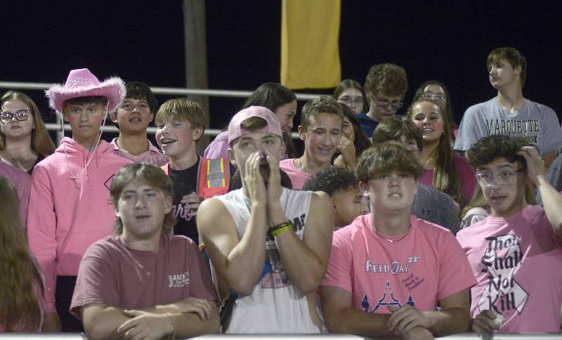 Marquette Crusader fans cheer on their team Friday against  Aurora Central Christian.