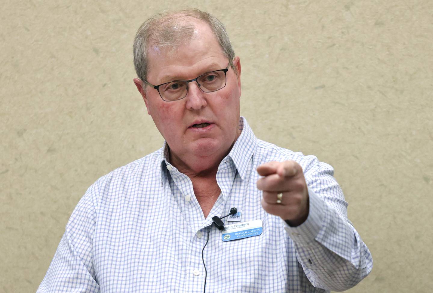 DeKalb County Board Chairman John Frieders calls on members of the audience who would like to speak during public comment at the DeKalb County Board's Committee of the Whole meeting Wednesday, April 13, 2022, at the DeKalb County Legislative Center in Sycamore.