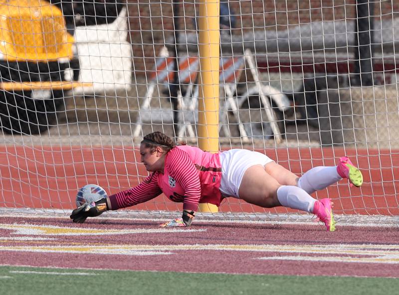 Richmond-Burton's goalkeeper Taylor Labay just misses the save as IC Catholic Prep Allie Geiger scores during the IHSA Class 1A girls soccer super-sectional match between Richmond-Burton and IC Catholic at Concordia University in River Forest on Tuesday, May 23, 2023.