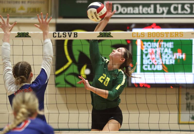 Crystal Lake South’s Morgan Johnson hits the ball against Lakes in IHSA Class 3A Sectional semifinal volleyball action on Tuesday, Nov. 5, 2024, at  Crystal Lake South High School  in Crystal Lake.